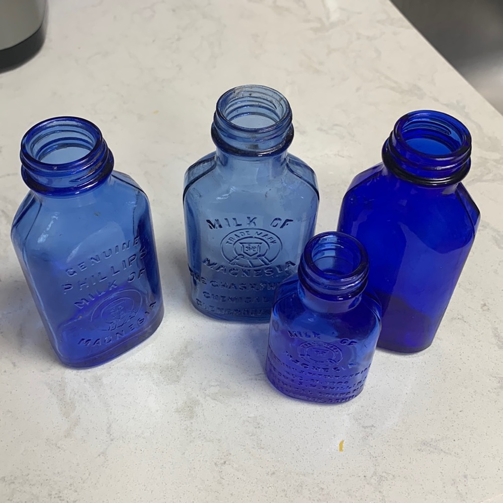 Antique Phillips Milk of Magnesia blue bottles, circa 1920s – 1930s